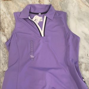Sleeveless athletic collared top by Tail. Size m.